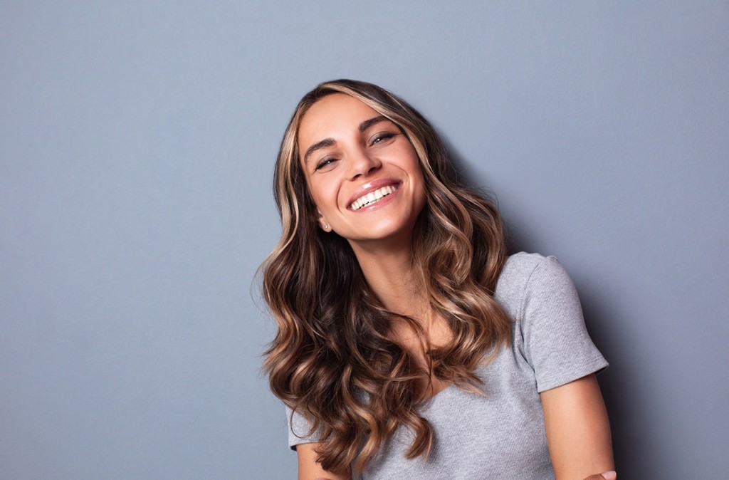 Woman Smiling after Jaw pain relief
